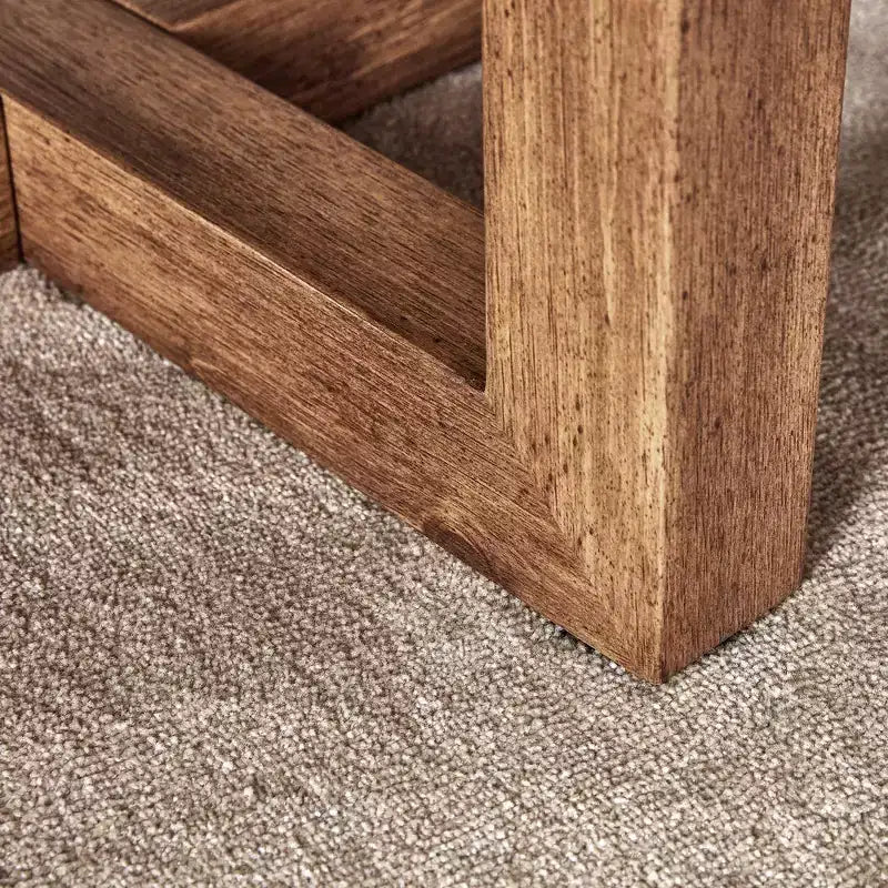 Table basse ronde de 80 cm avec plateau aspect pierre grise et pieds croisés