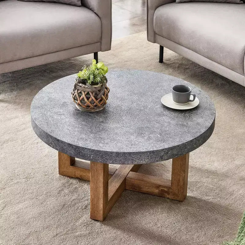 Table basse ronde de 80 cm avec plateau aspect pierre grise et pieds croisés