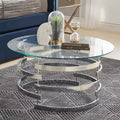 Table basse ronde en verre trempé avec piètement en fer argenté