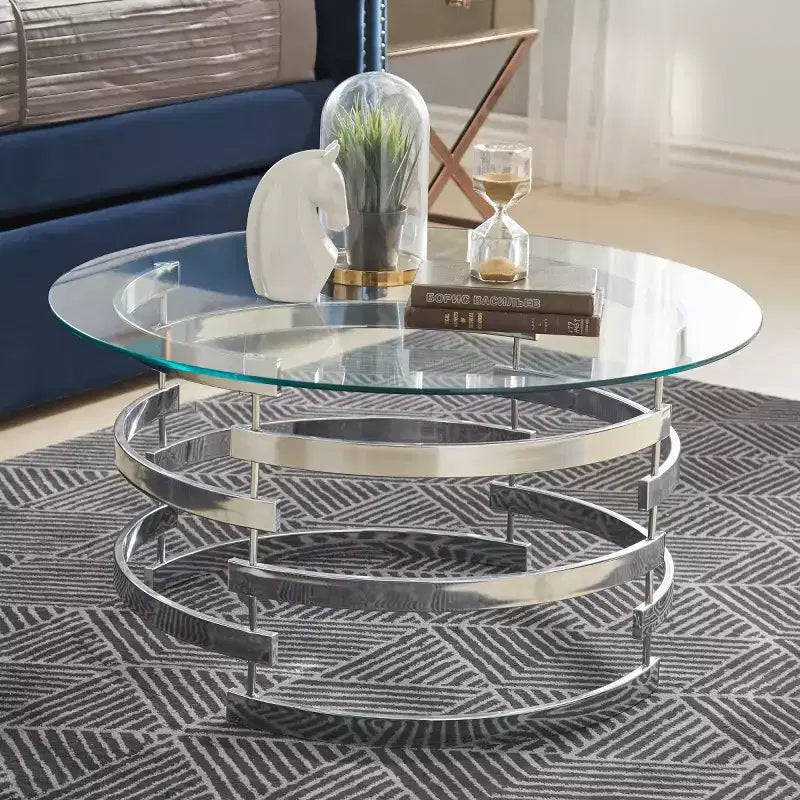 Table basse ronde en verre trempé avec piètement en fer argenté