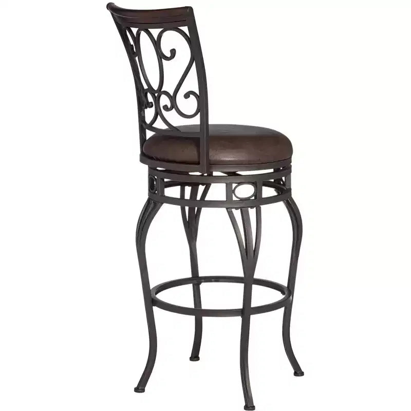 Tabouret de comptoir pivotant en bronze avec siège en similicuir et dossier en volutes